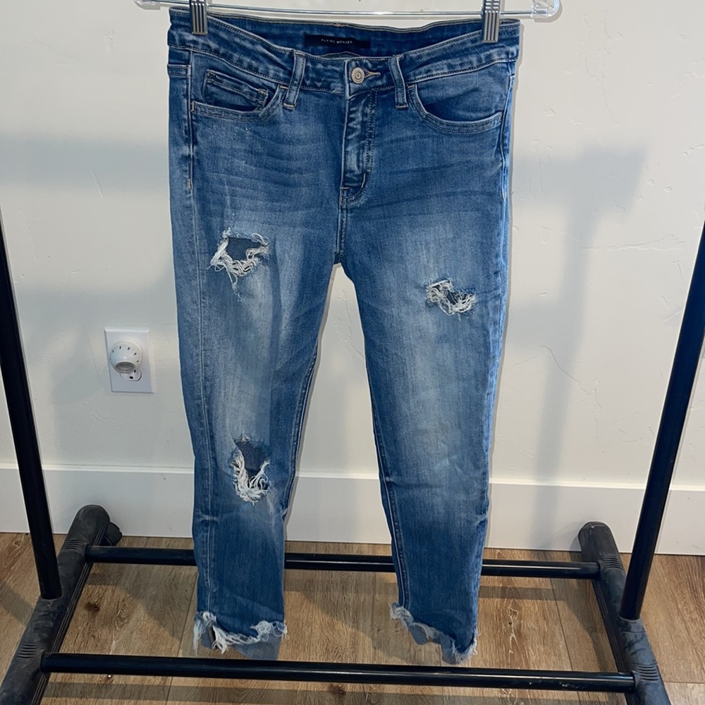 Distressed flying monkey jeans